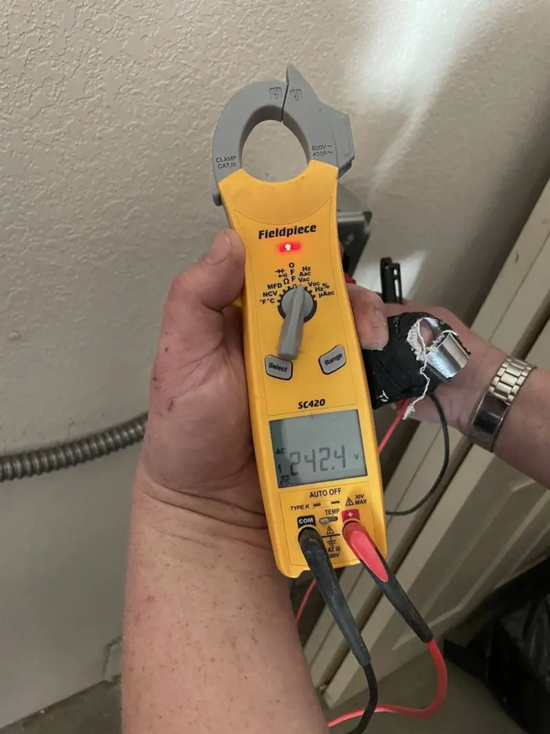 Voltage testing with clamp meter during Electrical Installation Services in West Linn